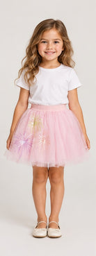 Girls model front view wearing Gingersnaps pale pink tulle skirt with embroidered motifs