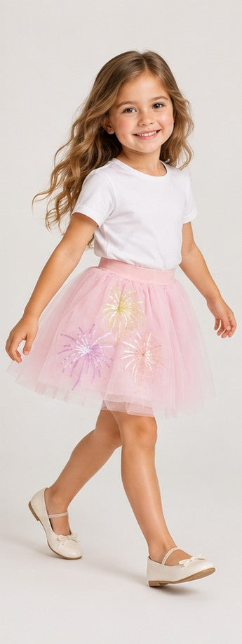 Girls model lifestyle view wearing Gingersnaps pale pink tulle skirt with embroidered motifs
