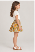 Girls' floral skirt on child model, right side view
