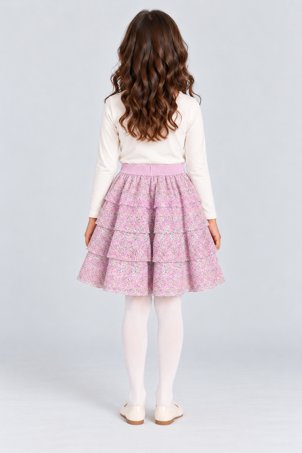 Girls multi-tier floral skirt on child model, back view