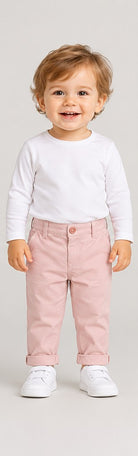 Front view of boys' pale pink infant chinos with folded cuffs on an infant boy