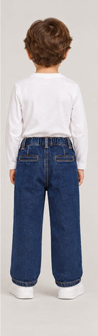 Back view of boys' dark indigo denim jeans on a young boy