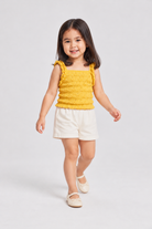 Gingersnaps baby girls yellow blouse, lifestyle view