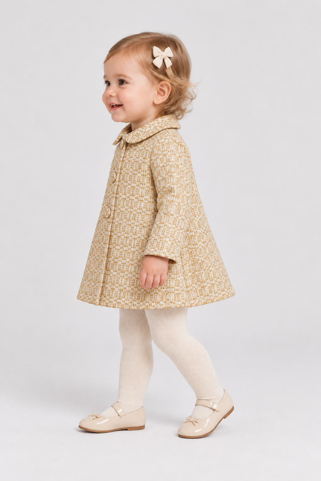 IGJK0037 gold textured baby coat, left model view