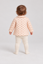 Back baby girl model view of Gingersnaps dotted jacket