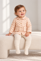 Lifestyle baby girl model view of Gingersnaps dotted jacket