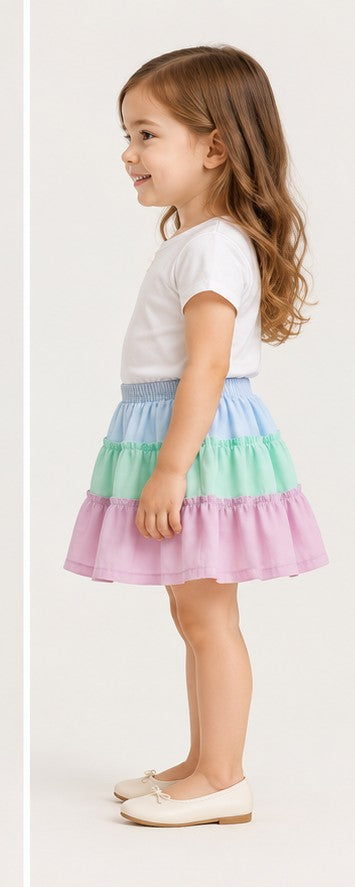 Girls toddler model left view wearing Gingersnaps pastel tiered skirt