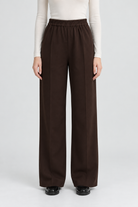 Garment-focused front view - brown long pants - Andrea