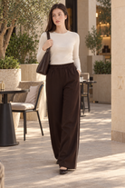 Lifestyle view - brown long pants - Andrea