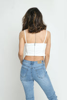 كيتشن بلوزة ساده نص بطن بحمالات رفيعة