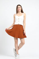 كيتشن بلوزة بدون أكمام مضلع سادة بأزرار أمامية