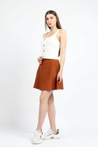 كيتشن بلوزة بدون أكمام مضلع سادة بأزرار أمامية