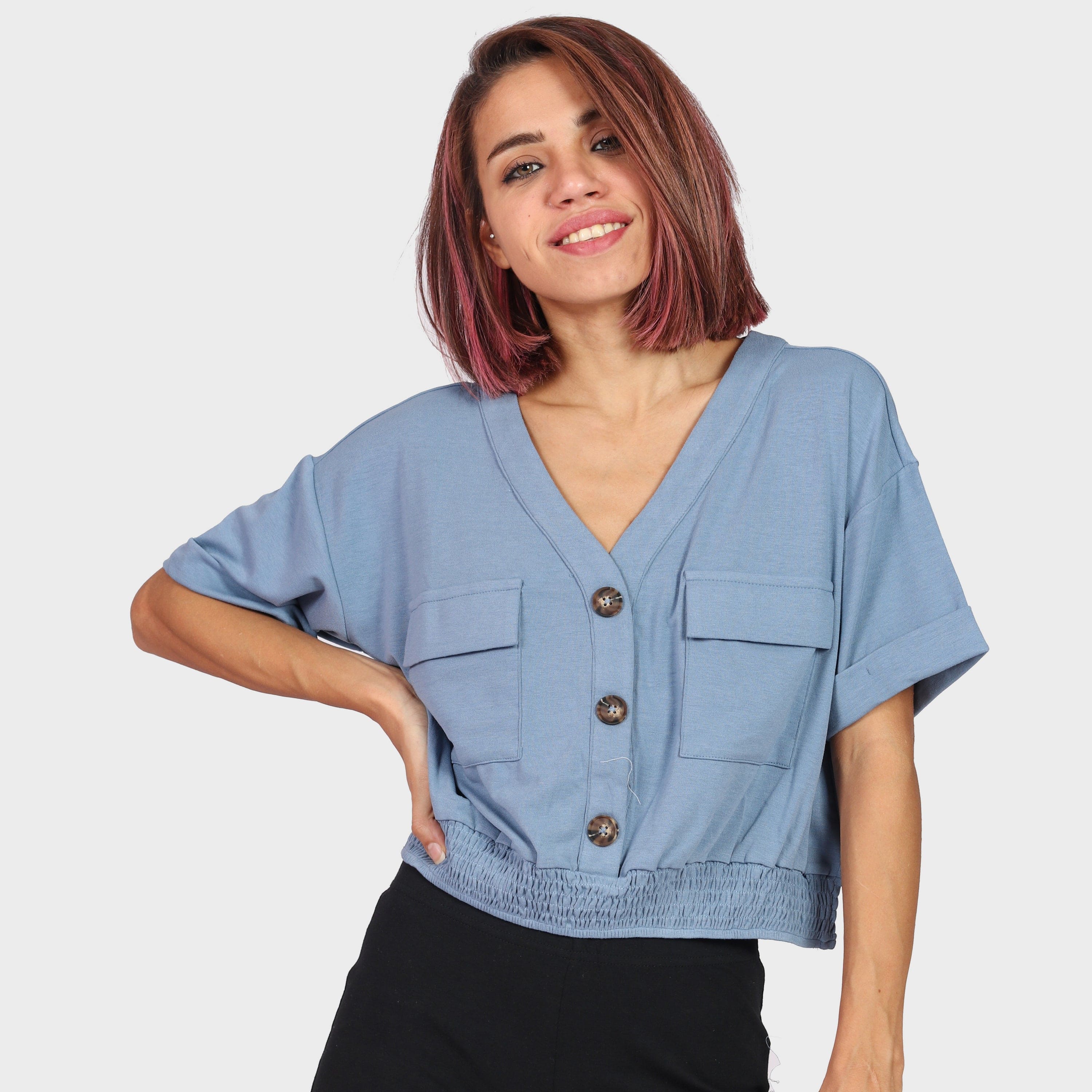 كيتشن بلوزة واسعة بأزرار أمامية وجيب يد نسائي