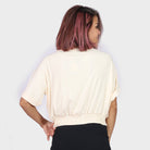 كيتشن بلوزة واسعة بأزرار أمامية وجيب يد نسائي