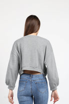 كيتشن بلوزة أوفر سايز قصيرة بكم طويل نسائي