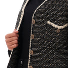 داليدرس جاكيت بخيوط متداخلة بأزرار أمامية كم طويل نسائي أسود/ذهبي