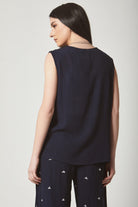 داليدرس بلوزة نسائية مطرزة من الأمام بدون أكمام