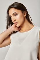 داليدرس بلوزة نسائية سادة بدون أكمام