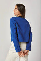 داليدرس جاكيت قصير سادة مزين بالستراس من أعلى نسائي أزرق