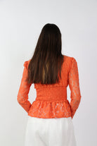 داليدرس بلوزة مخصرة دانتيل كم طويل نسائي برتقالي