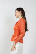 داليدرس بلوزة مخصرة دانتيل كم طويل نسائي برتقالي