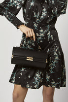 داليدرس فستان ميدي مخطط بالطول بربطة عنق بدون أكمام نسائي أسود