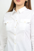 داليدرس بلوزة بجيوب أمامية سادة بأزرار أمامية كم طويل نسائي