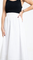 داليدرس تنورة طويلة سادة واسعة مع خط من أسفل نسائي