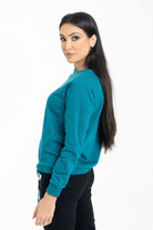 داليدرس سويت شيرت برسمة على الصدر كم طويل نسائي أخضر زمردي