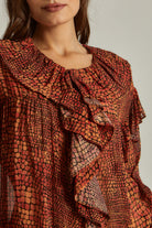 داليدرس بلوزة نسائية منقوشة بنقشة ثعبان برتقالي قاتم