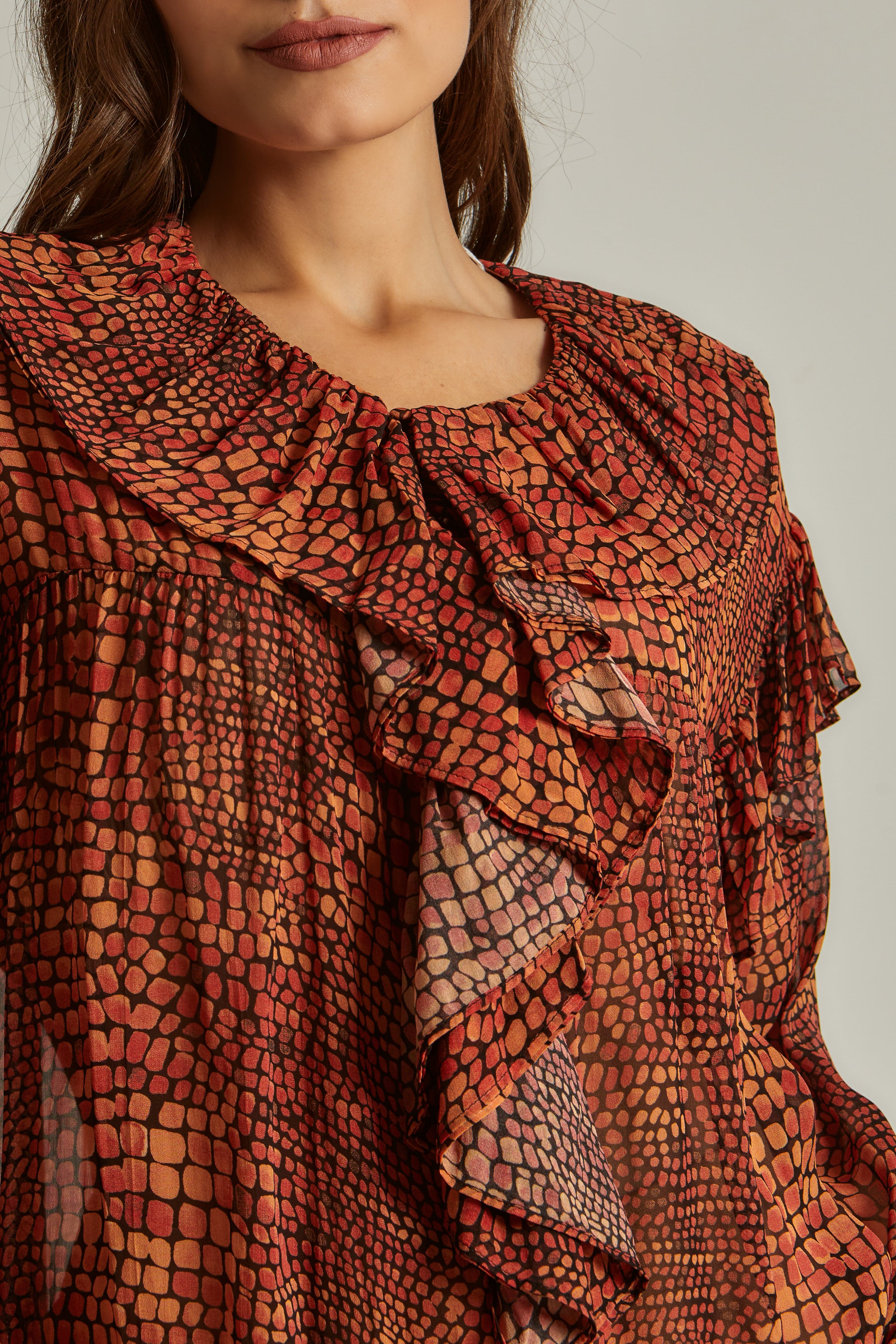 داليدرس بلوزة نسائية منقوشة بنقشة ثعبان برتقالي قاتم