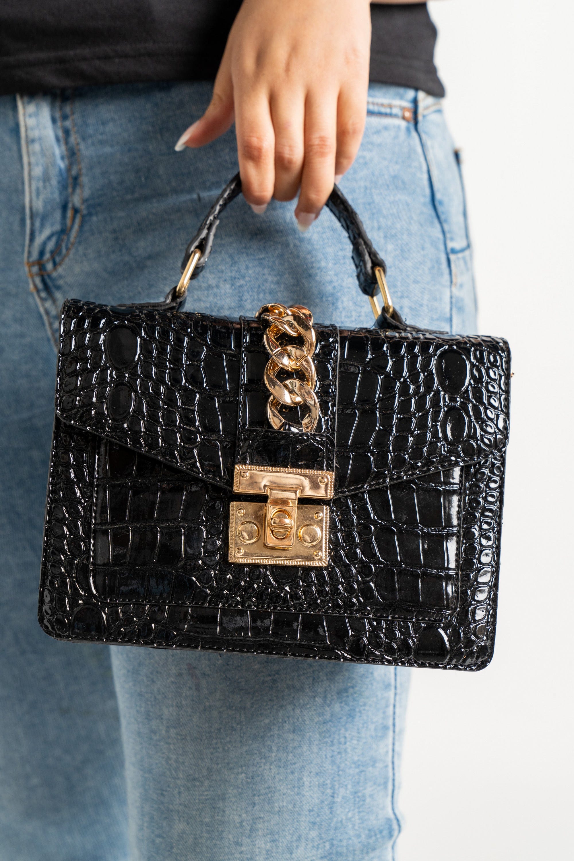 داليدرس حقيبة يد سادة مزينة بحلقات معدنية