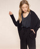 شانا جاكيت سادة بأكمام طويلة مع سحاب وحزام وكابيشو نسائي أبيض