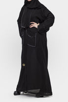 جوهرة عباية قماش كتان ة مطرزة بأزرار أمامية وجيوب أسود