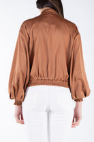 نتشي سترة سادة بسحاب وجيوب بأكمام طويلة