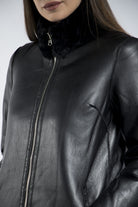 داليدرس جاكيت طويل جلد مزين بالفرو كم طويل