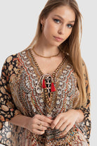 داليدرس قفطان منقوش واسع طويل نسائي وردي/أسود