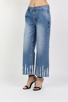 داليدرس بنطلون واسع جينز بنقشة من أسفل نسائي بني