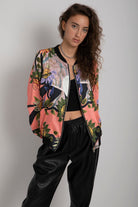 داليدرس جاكيت بطبعة أزهار بسحاب كم طويل وردي باهت