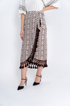 داليدرس تنورة نسائية لف منقوشة مزينة بكرانيش بيج فاتح