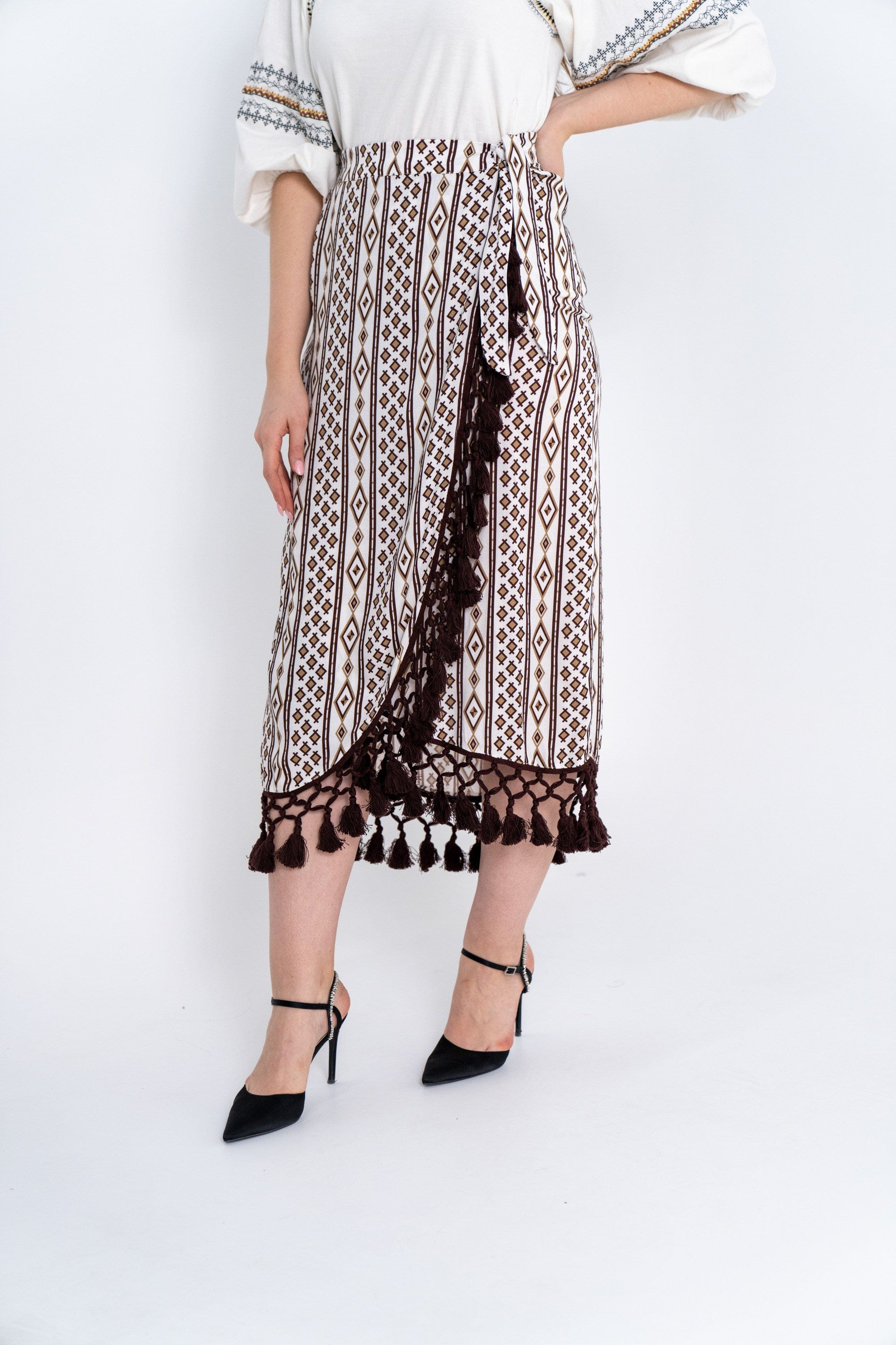 داليدرس تنورة نسائية لف منقوشة مزينة بكرانيش بيج فاتح