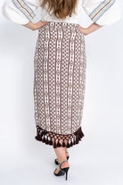 داليدرس تنورة نسائية لف منقوشة مزينة بكرانيش بيج فاتح