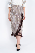 داليدرس تنورة نسائية لف منقوشة مزينة بكرانيش بيج فاتح