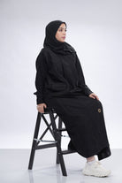 جوهرة عباية كتان طويلة سوداء بجيوب أمامية كم طويل أسود