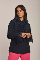 داليدرس بلوزة نسائية سادة كشكش من الأمام كم طويل