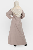 جوهرة عباية بأزرار كلاسيكية للنساء من جلد الغزال مع جيوب وردي فاتح