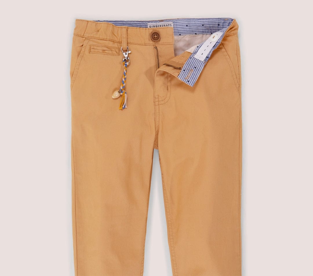 جينجرسنابس بنطلون ولادي سادة بسحاب وزرار أمامي برتقالي غامق