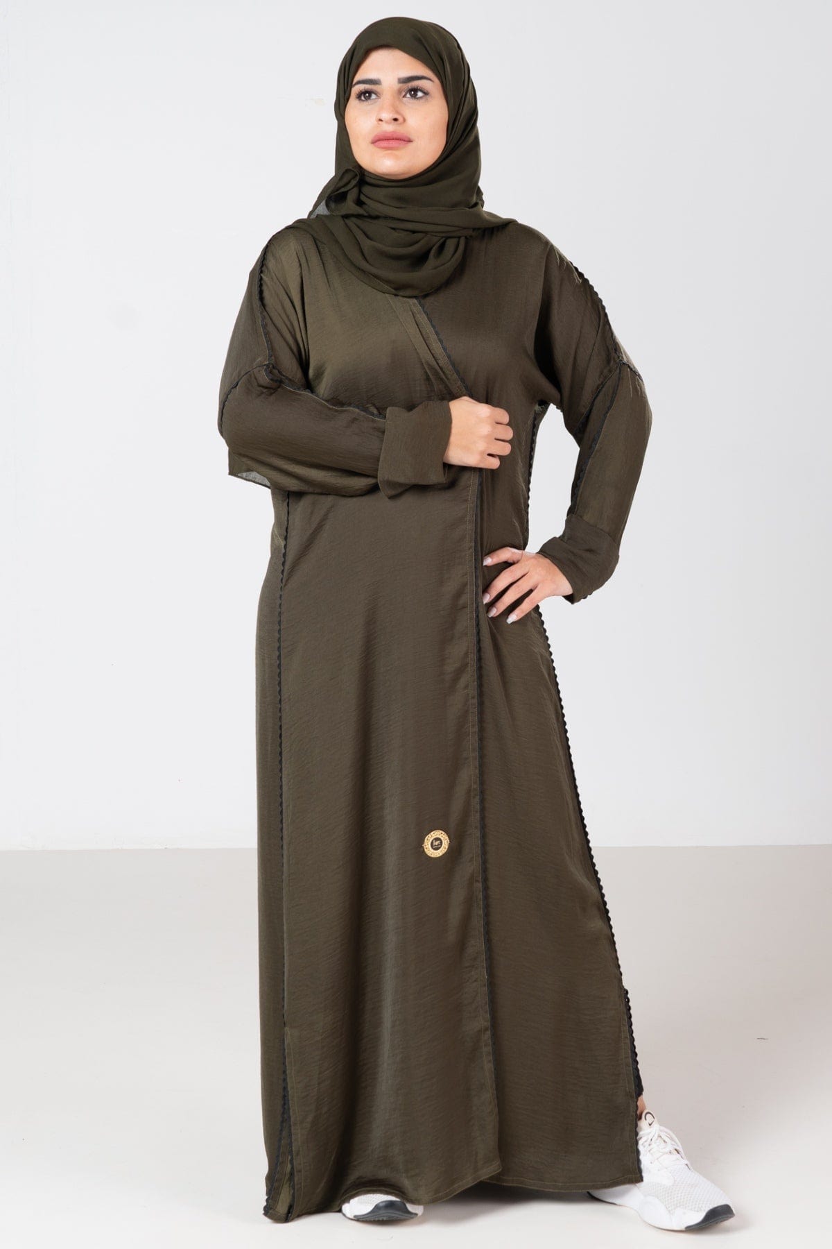 جوهرة عباية حرير مغسولسادة واسع كم طويل أخضر غامق