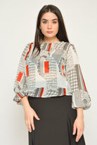 نتشي بلوزة منقوشة بكم طويل منفوخة نسائي