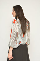 نتشي بلوزة منقوشة بكم طويل منفوخة نسائي